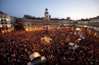 Protesters crowd Madrid's Puerta del Sol square during a rally at the end of a nationwide general strike